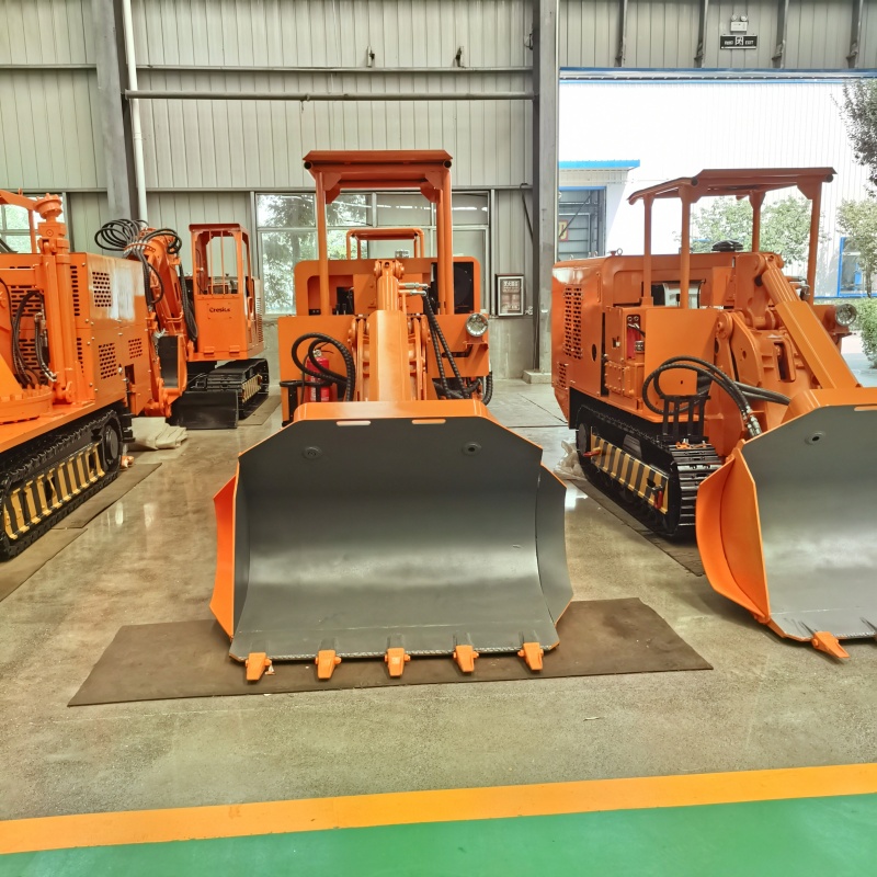 Carregador de rochas com descarga lateral