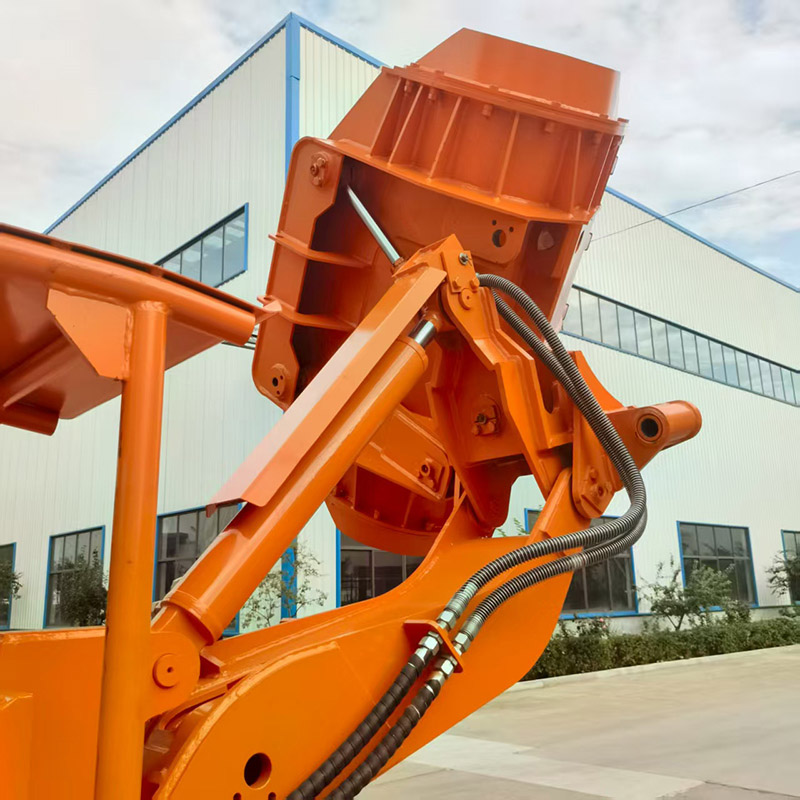 Cargador de rocas con descarga lateral de cantera