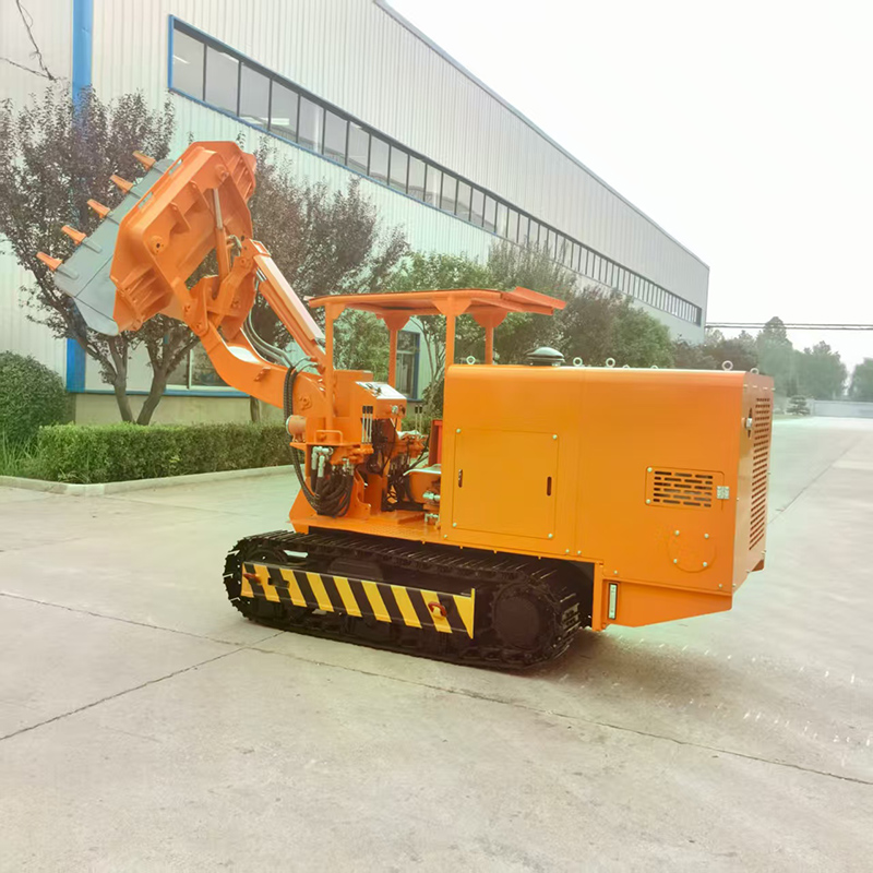 Cargadora de rocas con descarga lateral sobre orugas