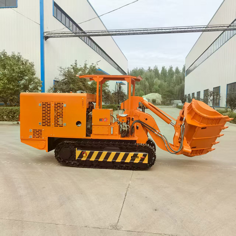 Máy xúc đá dỡ hàng bên đường hầm