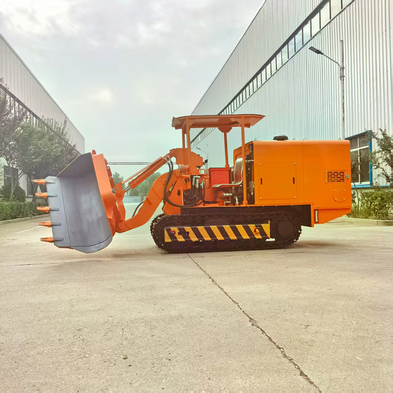 Máy xúc đá dỡ hàng bên đường hầm