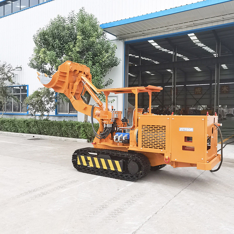 Carregadora de rochas sobre rastos