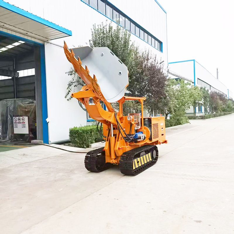 Carregadora de rochas sobre rastos