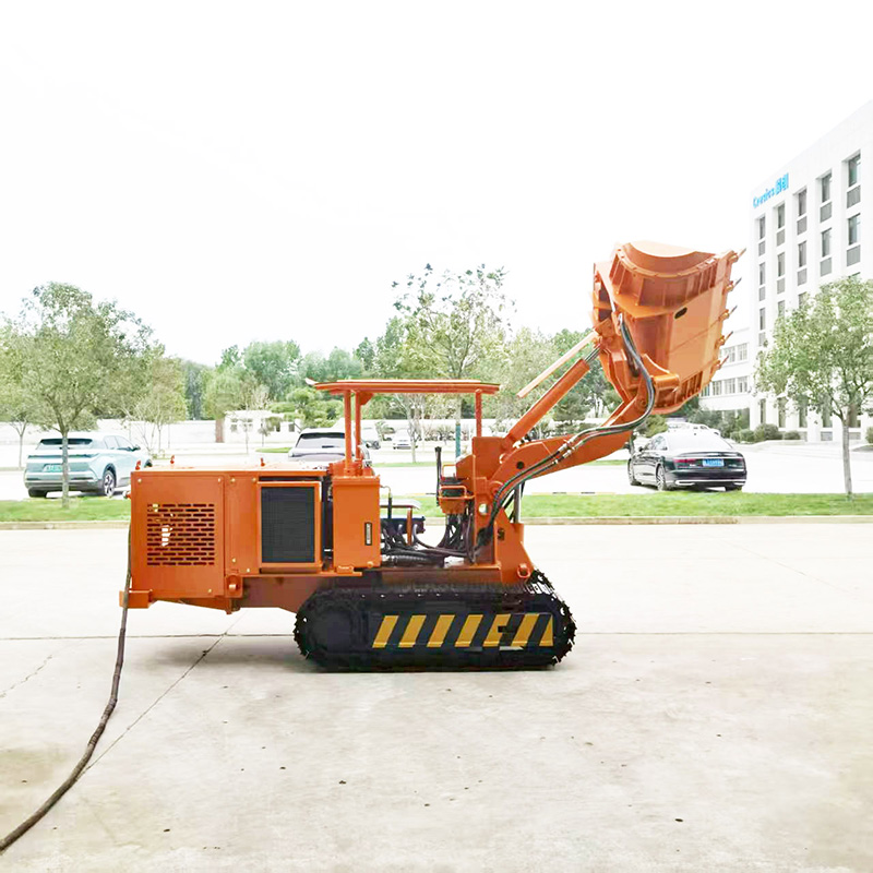 Carregador de rochas com rastos e descarga lateral