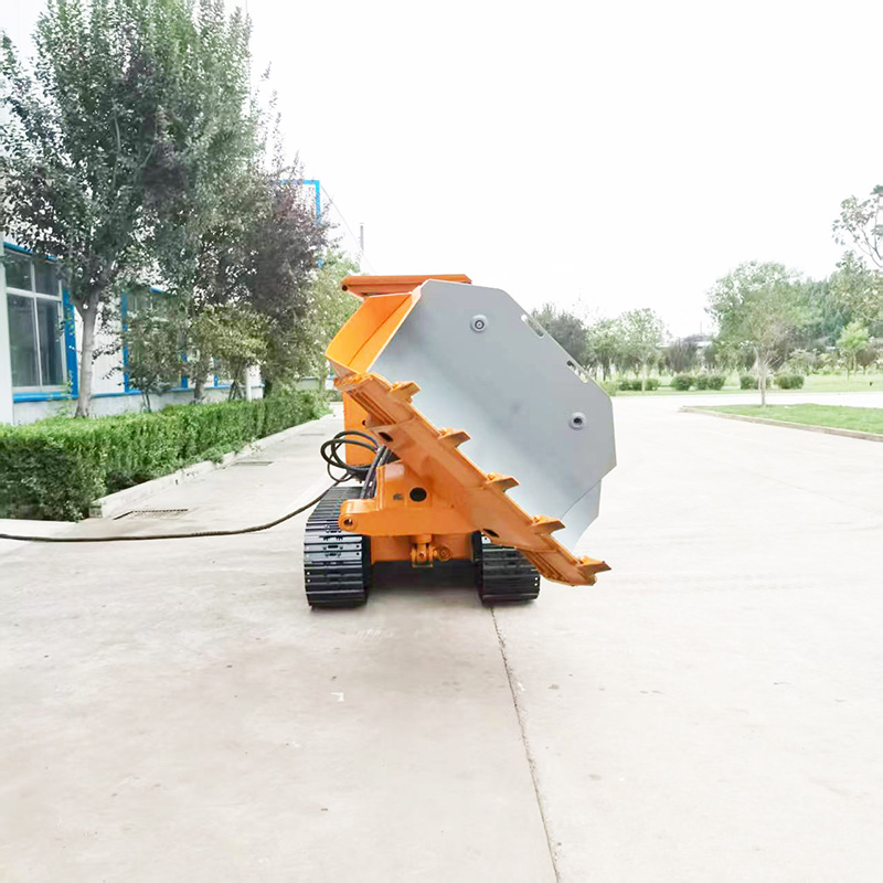 Carregadora de rochas sobre rastos