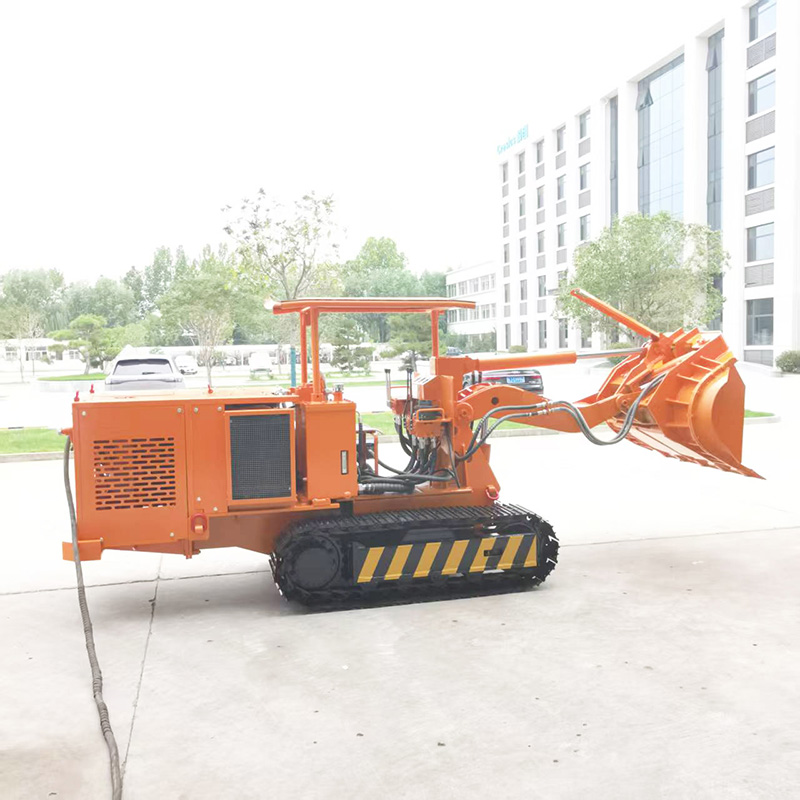 Carregador de rochas com rastos e descarga lateral