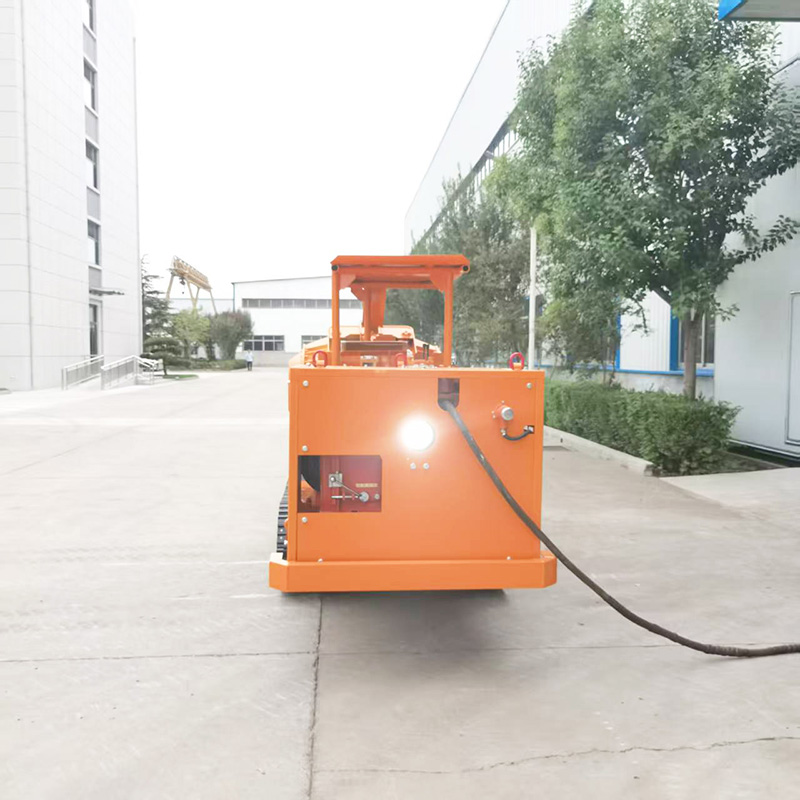 Cargador de rocas de descarga lateral eficiente