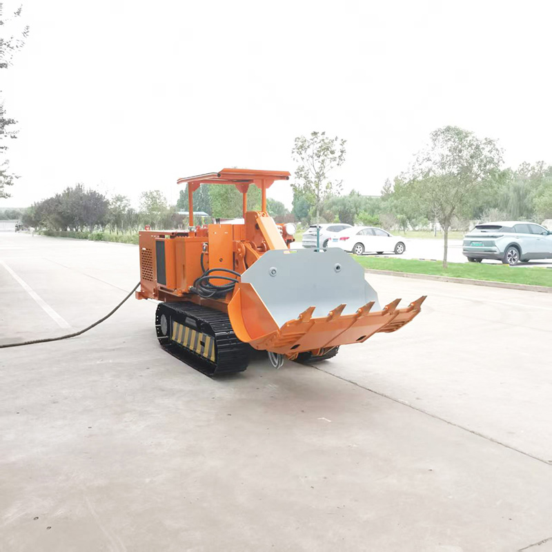 Carregador de rochas com rastos e descarga lateral